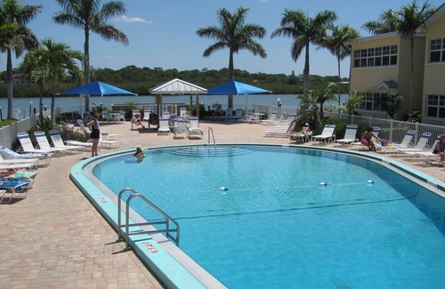Indian Shores Condo | BEST PRICE & CONDOS IN BAREFOOT BEACH RESORT - UNIT E213 - Very Bright End Unit