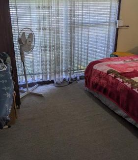 Bidwill House | BIDWILL GARDENS ON MIDDLETON - 2 Rooms A Private Room with a King-Size Bed or Open Lounge Room Floor Mattress SHARED Bathroom FREE Kitchen Essentials FREE Laundry Facilities Fast NBN WIFI HDTV NETFLIX, YOUTUBE, KAYO Meal and Transport Service Available