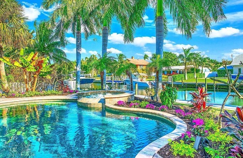 Anna Maria House | Bikini's & Martini's Waterfront Canal: 1 Block to Beach! Dock! On Canal! Anna Maria Life