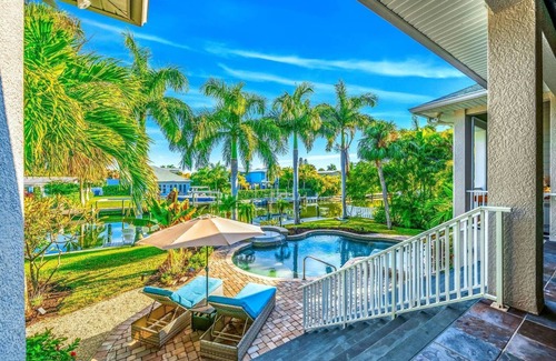 Anna Maria House | Bikini's & Martini's Waterfront Canal: 1 Block to Beach! Dock! On Canal! Anna Maria Life