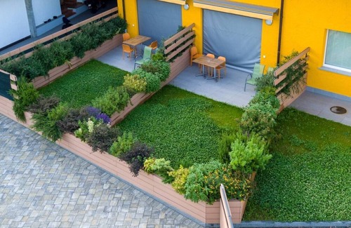 Giubiasco Apartment | Birch apartment surrounded by greenery