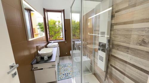 Siniscola Apartment | Blu Caletta - waterfront apartment with garden