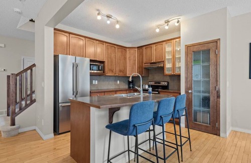 Southwest Calgary Apartment | Blue Moon | Playground | Backyard | Pet Friendly