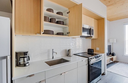 East Somerville Apartment | Blueground | Somerville, gym & w/d, nr Row