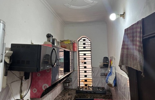 New Delhi Apartment | Blush & Boho Escape – Cozy 1BHK for Peaceful Stays