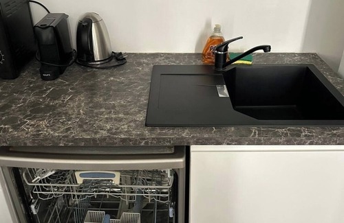 Saint-Gervais Apartment | BnBNook - Parisian Charm: 1BR in Le Marais