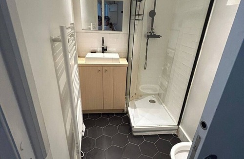 Saint-Gervais Apartment | BnBNook - Parisian Charm: 1BR in Le Marais