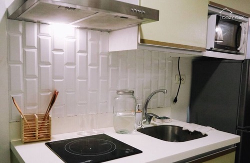 San Fernando Condo | Boho-Themed Studio with Pool View Balcony, Netflix, Karaoke & Boardgames