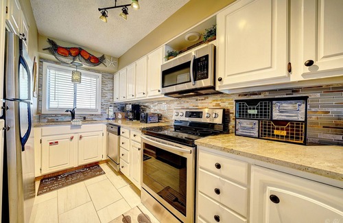 Biltmore Beach Condo | BOOK SOME TIME ON THE BEACH SLEEPS 4 beach chairs in season