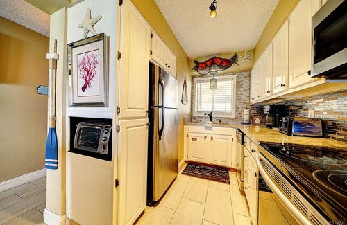 Biltmore Beach Condo | BOOK SOME TIME ON THE BEACH SLEEPS 4 beach chairs in season