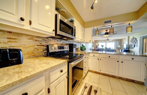 Biltmore Beach Condo | BOOK SOME TIME ON THE BEACH SLEEPS 4 beach chairs in season