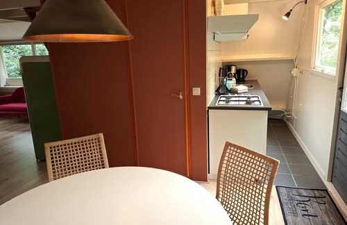 Rekem Ski Chalet | Bosrijk gelegen vakantiehuis met optimale privacy!
