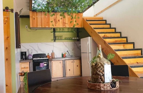 Primera Seccion House | Bottle House