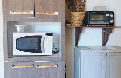 Sao Goncalo do Rio das Pedras House | House of the Mango Trees in the main square in São Gonçalo do Rio das Pedras