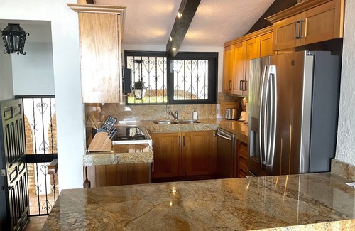 Downtown Puerto Vallarta Condo | Breezy Ocean View, 4 Blocks from the Malecon in Lush Garden Setting