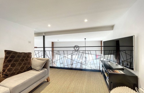 Saugues Bed & Breakfast | Bright family room with children’s area in Saugues
