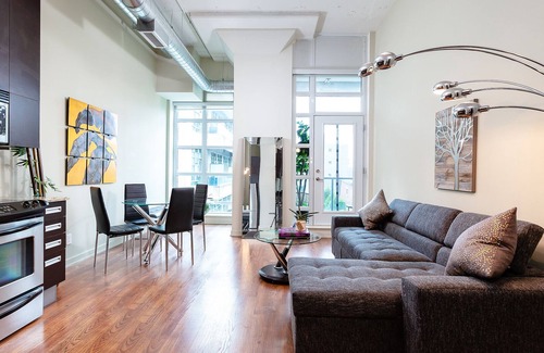 Midtown Toronto Condo | Bright loft one bedroom with den, steps to subway, Casa Loma and Yorkwille