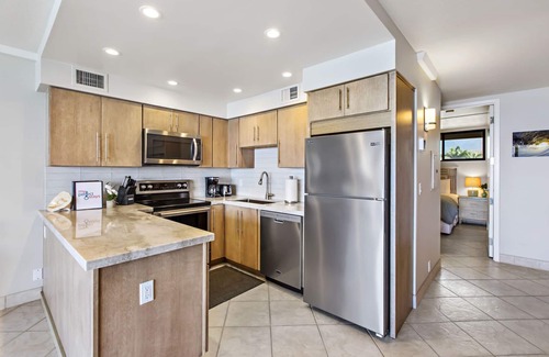 Honokowai Condo | Bright, modern space with stunning ocean views