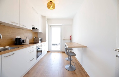 Gare Apartment | Bright & Stylish 2BR Apt in City Center