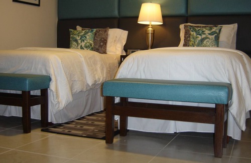 Buccoo Condo | Buccoo-B - Cozy Boutique condo located in the goat-racing village of Tobago!