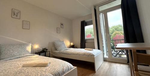 Osnabrueck Apartment | Business Apartment with Balcony