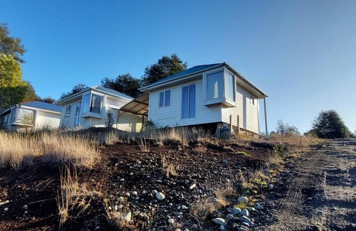 Rilan House | Cabaña Carpintero negro