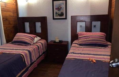 La Laguna Ski Chalet | Cabaña de las Flores. Magia en la laguna