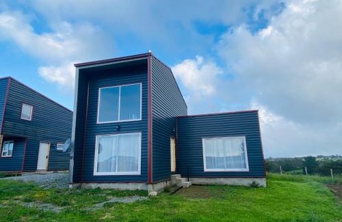 Ancud House | Cabañas Pacífico - Faro Corona