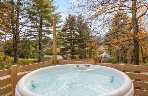 Johnson House | Caboose Tiny Home on river with hot tub near Stowe