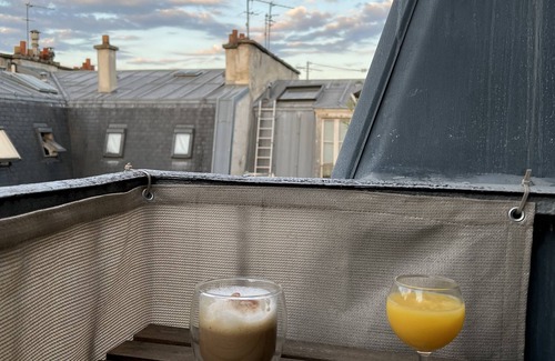 Saint-Victor Apartment | Calm sunny loft studio that looks out onto Paris rooftops in the city center