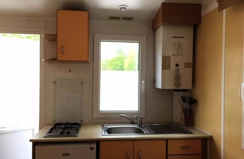 Thiviers House | Camping Le Repaire * - Small 2 bedroom mobile home - uncovered wooden terrace - 20m² (R14 -R15 - R21 + 038) 4 people