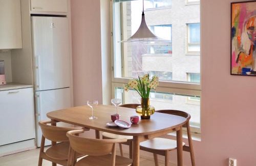 Keskinen District Apartment | Candy-Colored Two-Room Condo with Sweet views