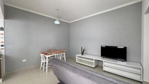 Centro House | Cantinho Perfeito para Dois Conforto e Mar Bem Pertinho, Casa terrea no centro 80M Praia, Ar, Enxoval,Estacionamento e churrasqueira