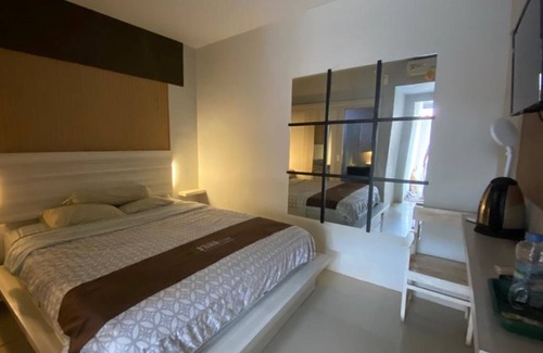 Pati Hotel | Capital O 93450 Hotel D'lala