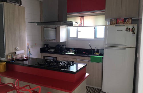 Tupy House | Casa com Piscina em Condomínio Fechado com Segurança 24h de Frente Para o mar