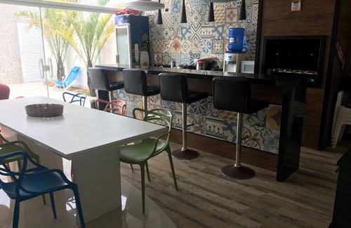 Tupy House | Casa com Piscina em Condomínio Fechado com Segurança 24h de Frente Para o mar