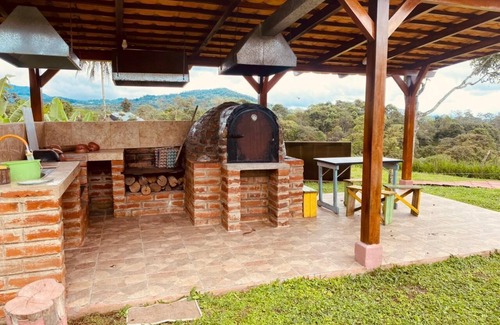 Pacto Cottage | Casa de Campo CAMVUL lodging; connect with Choco Andean Nature
