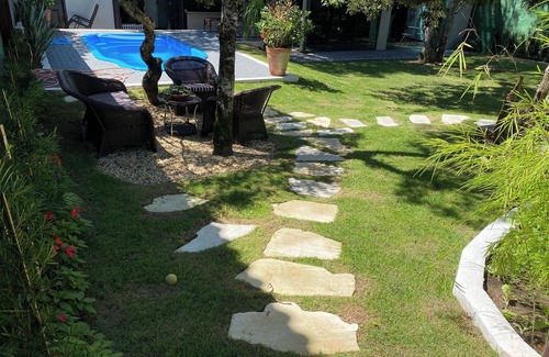 Porto da Lagoa House | Casa de Praia com Trilha Privativa em Condomínio Fechado