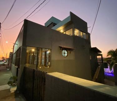 Praia da Vila House | Casa de Praia Suítes