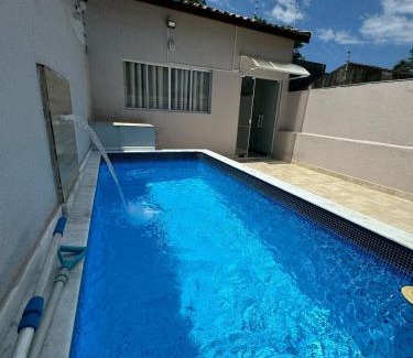 Tupy House | Casa em Itanhaém com Piscina e Ar condicionado à 900 Metros da Praia