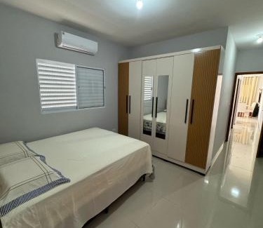 Tupy House | Casa em Itanhaém com Piscina e Ar condicionado à 900 Metros da Praia