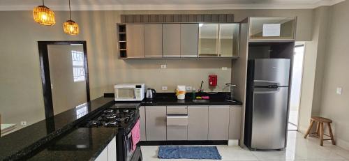 Maringa Villa | Casa espaçosa, mesa de sinuca e piscina aquecida!