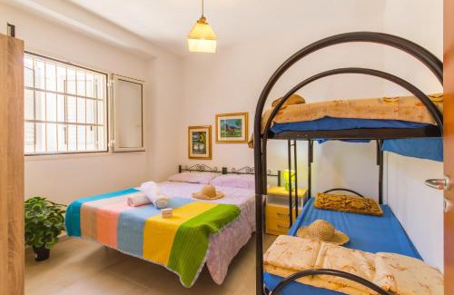 Sant'Isidoro Apartment | Casa Lory 3 Cozy And Near The Sea - Happy Rentals