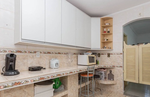 Pereque House | Casa no Guarujá com piscina e lazer completo