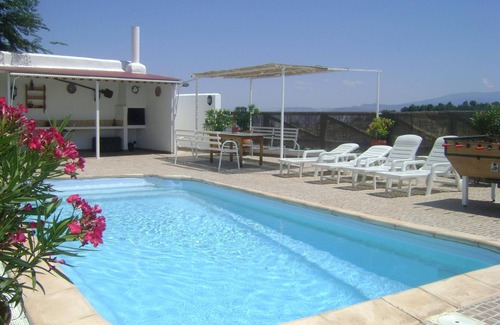 Cuevas del Campo House | Casa Triana with Mountain View, Shared Pool, Terrace & Wi-Fi