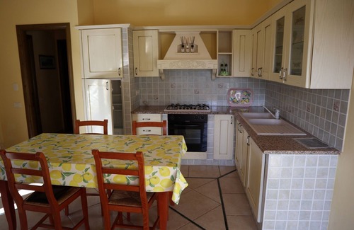Porto Pino House | Casa Vacanze a Pochi Passi Dalla Bellissima Spiaggia di Portopino
