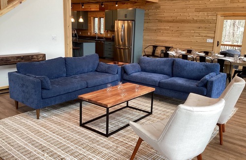 Waterfront Greens House | Casamigos | Newly Built Log Cabin + Private Hot Tub in Gated Community