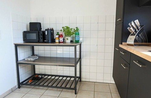Korbecke Apartment | Central, stylish and modern holiday apartment with balcony and box-spring beds