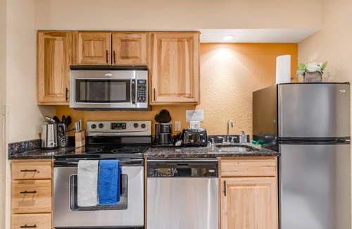 Wisconsin Dells Condo | Centrally located condo with balcony, fireplace, and AC - water views