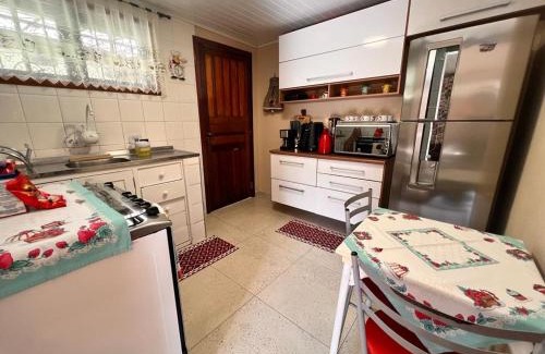 Vila Telma Ski Chalet | Chalé Completo 5min centrinho